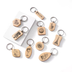 10 porte clés en bois xtool de tailles différentes gravés avec differents motifs